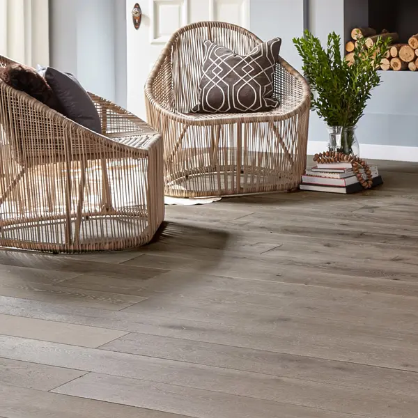 French Oak Plank 2 Living room scene - two bamboo chairs on dark wood floor.