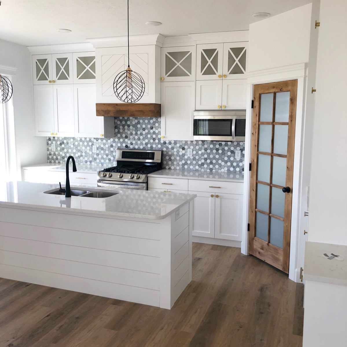 Kitchen with hardwood flooring