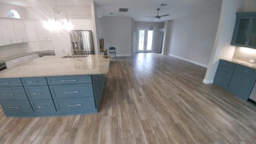 Kitchen scene - Bleached Plank flooring.
